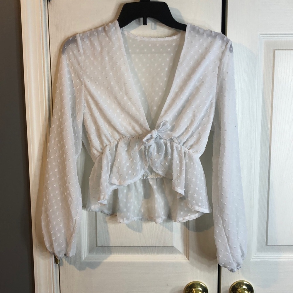 White poke a dot tie shirt